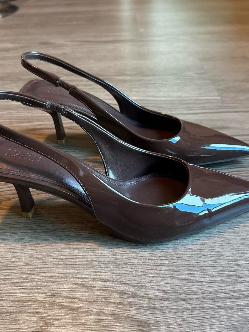 NA-KD brown patent leather slingback heels